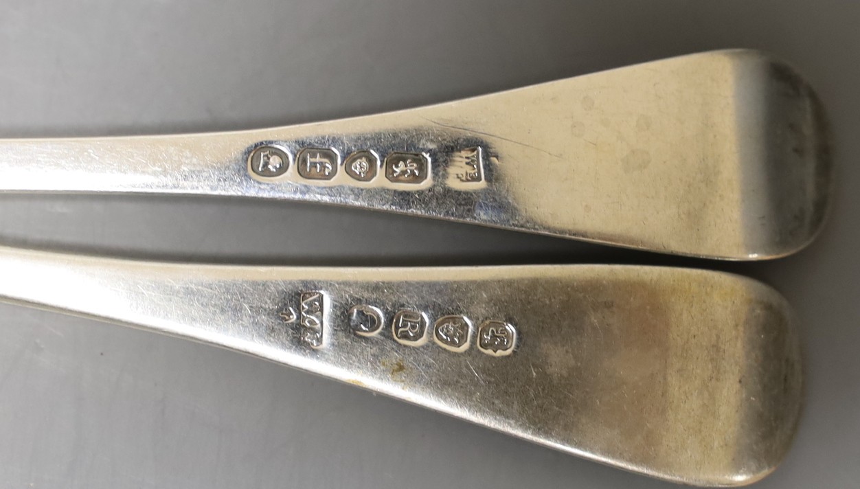 A matched harlequin set of twenty four late 18th/early 19th century silver Old English pattern feather edge table forks, various dates and makers, including eight Irish, by Michael Keating, Dublin, 1771/1773